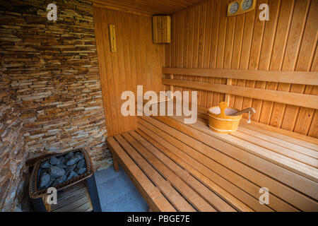 Empty sauna room with traditional sauna accessories Stock Photo