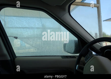 Interior view of car at self service car wash Stock Photo