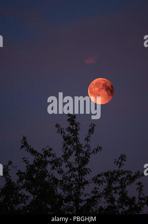 View of Total Lunar Eclipse bloodmoon on July 28 2018 in Germany Stock Photo