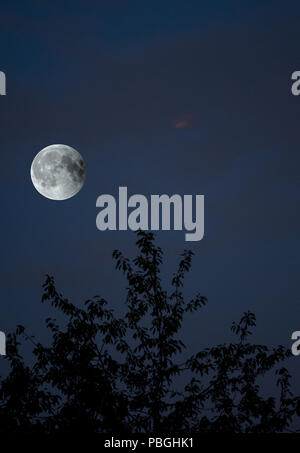 View of Total Lunar Eclipse bloodmoon on July 28 2018 in Germany Stock Photo