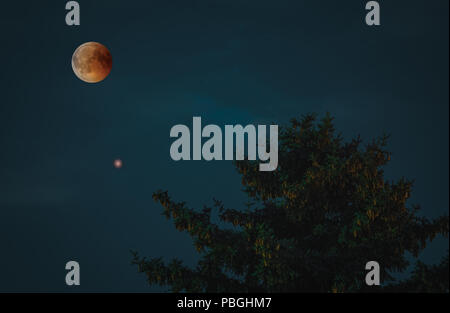 View of Total Lunar Eclipse bloodmoon on July 28 2018 in Germany Stock Photo