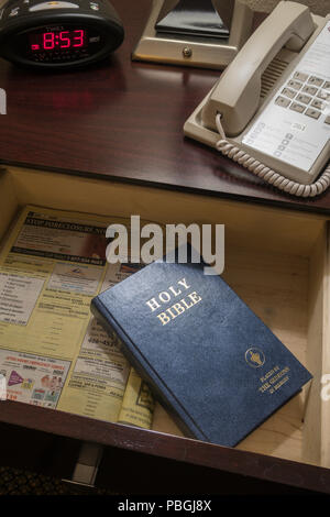 Holy Bible in Hotel Room Bedside Table Drawer, USA Stock Photo