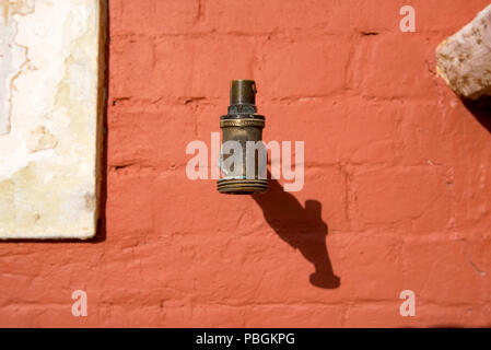 An old brass tap attached to an outside wall of the historic Bathurst Railway Station in NSW, Australia Stock Photo