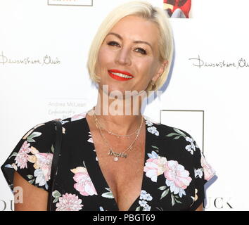 Television personality Denise Van Outen takes a ride in Postman Pat's