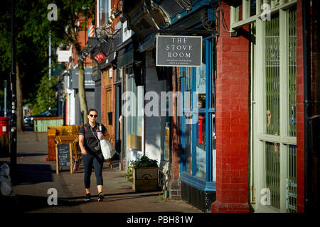 BURTON Road in West Didsbury local independent shops and restaurants Stock Photo