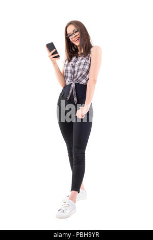 A Woman In A Suit Holding A Smartphone And Making A Guts Pose Stock  Illustration - Download Image Now - iStock