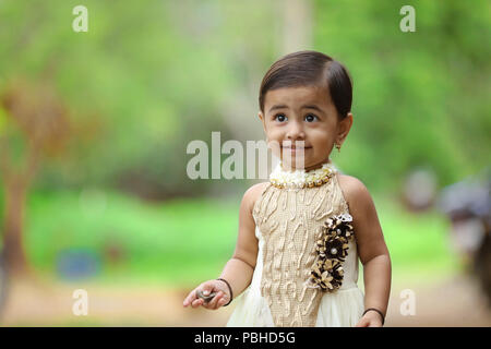 indian girl child holding indian flag Stock Photo