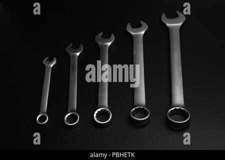 The wrench steel tools for repair on black background. Stock Photo