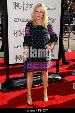 Emily Procter ( CSI Miami )  arriving at the HARRY POTTER and the Order of the Phoenix Premiere at the Chinese Theatre in Los Angeles.  full length eye contact ProcterEmily 164 Red Carpet Event, Vertical, USA, Film Industry, Celebrities,  Photography, Bestof, Arts Culture and Entertainment, Topix Celebrities fashion /  Vertical, Best of, Event in Hollywood Life - California,  Red Carpet and backstage, USA, Film Industry, Celebrities,  movie celebrities, TV celebrities, Music celebrities, Photography, Bestof, Arts Culture and Entertainment,  Topix, vertical, one person,, from the year , 2007, i Stock Photo