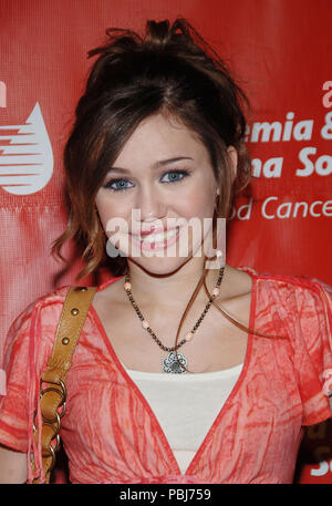 Miley Cyrus arriving at theRock N' Bowl Celebrity Bowling at the Lucky Stike in Los Angeles. April 6 2006.CyrusMiley1094 Red Carpet Event, Vertical, USA, Film Industry, Celebrities,  Photography, Bestof, Arts Culture and Entertainment, Topix Celebrities fashion /  Vertical, Best of, Event in Hollywood Life - California,  Red Carpet and backstage, USA, Film Industry, Celebrities,  movie celebrities, TV celebrities, Music celebrities, Photography, Bestof, Arts Culture and Entertainment,  Topix, headshot, vertical, one person,, from the year , 2006, inquiry tsuni@Gamma-USA.com Stock Photo