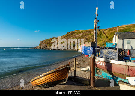 Lulworth Cove Dorset England July 28, 2018 Fishing boats in this picturesque cove on Dorset's Jurassic Coast Stock Photo