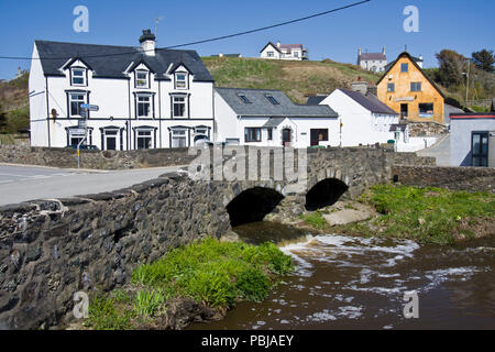 The bridge over the river Cyllyfelin where it joins the river Daron, in Aberdaron, Gwynedd, North Wales. Stock Photo