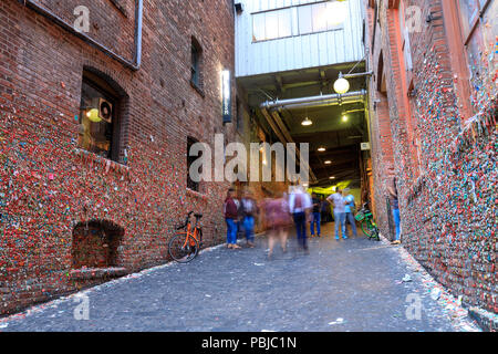 Seattle, Washington - June 30, 2018 : The Market Theater Gum Wall in downtown Seattle. It is a local landmark in downtown Seattle, in Post Alley under Stock Photo