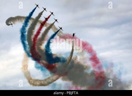 The Red Arrows perform an RAF100 tribute during Scotland's National Airshow which is taking place at the National Museum of Flight in East Lothian. Stock Photo