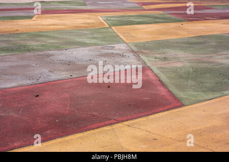 Multi-colored floor in a recreation area in a public park Stock Photo