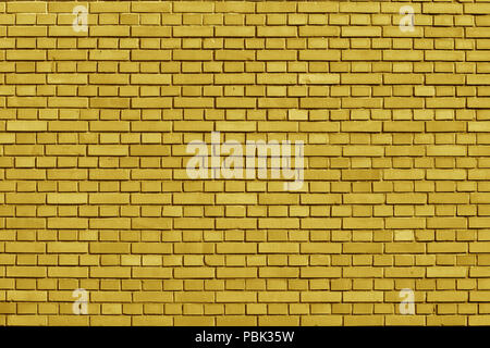 Ceylon Yellow colored brick wall background Stock Photo