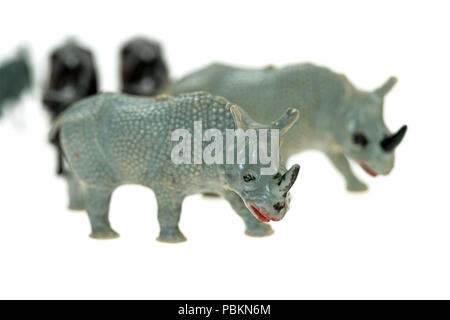 Toy rhinoceros from a vintage Noah's Ark play set, photographed on a white background. Stock Photo