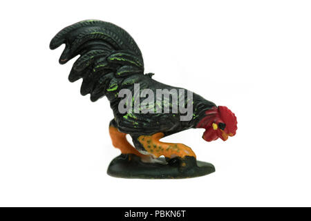 Toy rooster from a vintage Noah's Ark play set, photographed on a white background. Stock Photo