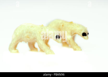 Toy polar bears from a vintage Noah's Ark play set, photographed on a white background. Stock Photo