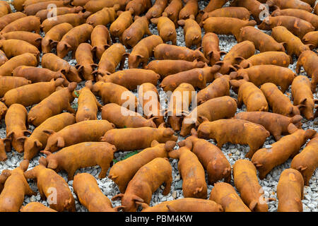 A litter of piglets made from cast iron at the British Ironworks Centre in Shropshire, England. Stock Photo