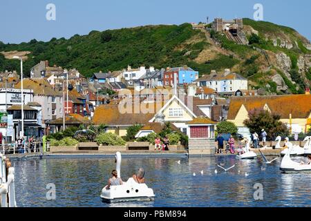 The seafront at Hastings old town area on a hot summer's day east Sussex England UK Stock Photo