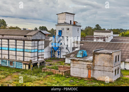 Vitebsk, Belarus - July 7, 2018:  industrial landscape: old brick Belarusian warehouses with grain. Stock Photo