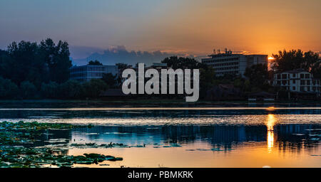 A superb sunset in Neptun Romania  . Facing the lake and the hotel. Stock Photo