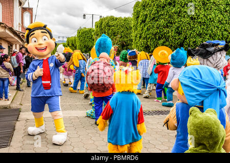 Parramos, Guatemala - December 28, 2016: Parade of cartoon characters in village near Spanish colonial town & UNESCO World Heritage Site of Antigua. Stock Photo