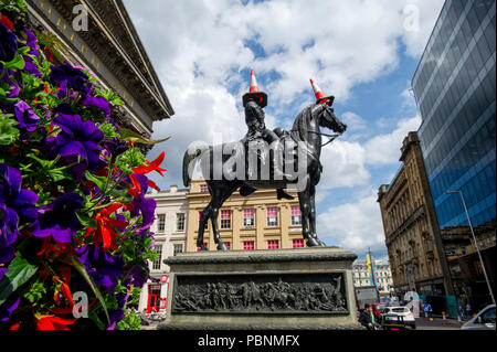 The equestrian Wellington Statue is a statue of Arthur Wellesley, 1st Duke of Wellington, located on Royal Exchange Square in Glasgow, Scotland. Stock Photo