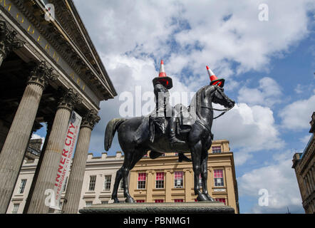 The equestrian Wellington Statue is a statue of Arthur Wellesley, 1st Duke of Wellington, located on Royal Exchange Square in Glasgow, Scotland. Stock Photo