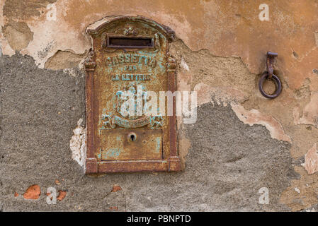 old metal letter box  in Lucignano D'asso in Tuscany , Italy Stock Photo