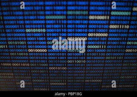 blue binary code. blocks of binary data. Blockchain concept. blue background with computer digital binary code bit number one and zero text. Stock Photo