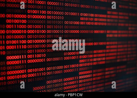 red binary code. computer technology background. red binary code computer language data transfers. unsecured and dangerous big data and ai artificial Stock Photo