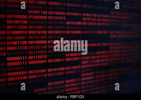 red binary code. computer technology background. red binary code computer language data transfers. unsecured and dangerous big data and ai artificial Stock Photo