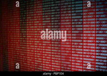red binary code. computer technology background. red binary code computer language data transfers. unsecured and dangerous big data and ai artificial Stock Photo