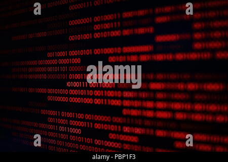red binary code. computer technology background. red binary code computer language data transfers. unsecured and dangerous big data and ai artificial Stock Photo