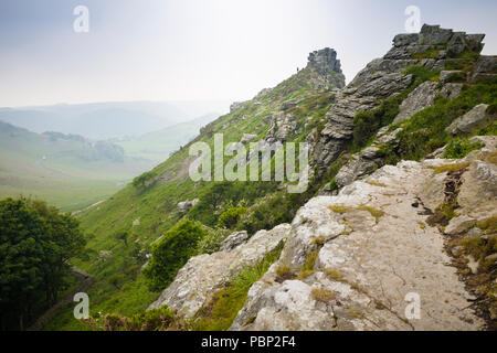 Walkers at the Valley of Rocks, Lynton, North Devon, looking inland, on the South West Coast Path. Stock Photo