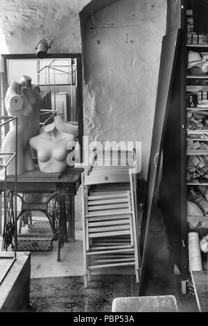 Old dressmakers workshop with mannequins in Prague - monochrome image Stock Photo