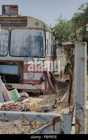 Old vintage rusty regular bus on the island Rhodes (Greece) Stock Photo