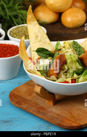 Taco salad in a baked tortilla Stock Photo