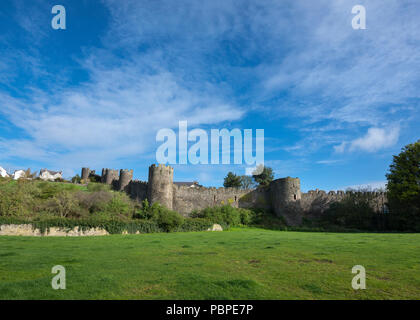 The old medieval town walls at Conwy in North Wales, UK. A sunny spring day on the outside of the town. Stock Photo