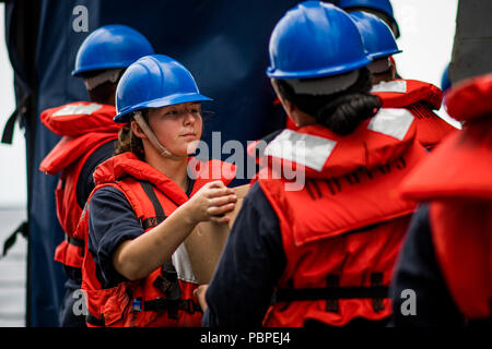 https://l450v.alamy.com/450v/pbpej4/180720-n-li768-1155-pacific-ocean-july-20-2018-personnel-specialist-3rd-class-talia-toelle-from-des-moines-iowa-passes-a-box-of-food-aboard-the-guided-missile-destroyer-uss-dewey-ddg-105-during-a-connected-replenishment-dewey-is-underway-in-the-us-3rd-fleet-area-of-operations-us-navy-photo-by-mass-communication-specialist-2nd-class-devin-m-langerreleased-pbpej4.jpg