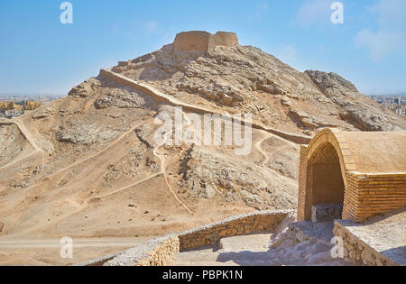 Zoroastrian traditional Towers of Silence located on the hills in desert next to Yazd, Iran. Stock Photo