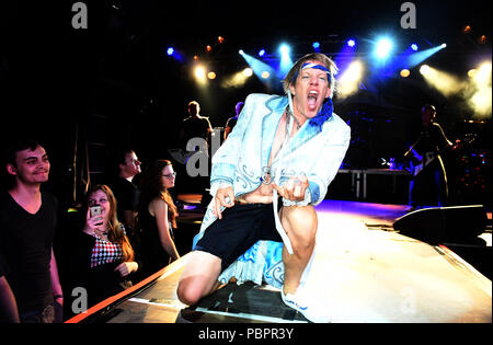 Munich, Germany. 28th July, 2018. Bavaria, Germany, 28 July 2018.  Simon Zorn plays backstage in the main round of the 15th German Air Guitar Championship Air Guitar. Credit: Felix Hörhager/dpa/Alamy Live News Stock Photo