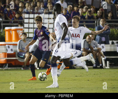 Los Angeles, California, USA. 28th July, 2018. FC Barcelona's Ricard Puig (8) and Tottenham Hotspur's Oliver Skipp (52) in actions during the International Champions Cup match on July 28, 2018 in Pasadena, California. Barcelona won 5-3 on penalty kicks after the match was tied 2-2 in regulation. Credit: Ringo Chiu/ZUMA Wire/Alamy Live News Stock Photo