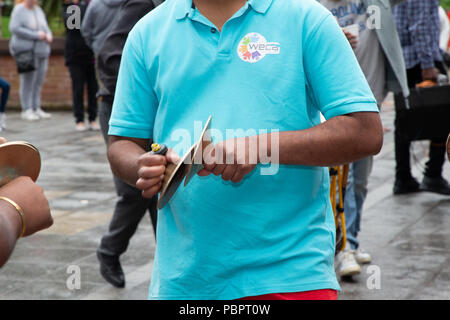 Warrington, UK, 29 July 2018.   Warrington Ethnic Communities Association (WECA) held its fifth annual MELA Festival. The usual walk from The Town Hall did not take place due to the wet and windy weather and the event that should have been held in the Queen’s Gardens at Palmyra Square, close to the Town Centre, was changed to inside the Parr Hall building Stock Photo