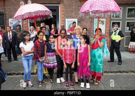 Warrington, UK, 29 July 2018.   Warrington Ethnic Communities Association (WECA) held its fifth annual MELA Festival. The usual walk from The Town Hall did not take place due to the wet and windy weather and the event that should have been held in the Queen’s Gardens at Palmyra Square, close to the Town Centre, was changed to inside the Parr Hall building Stock Photo