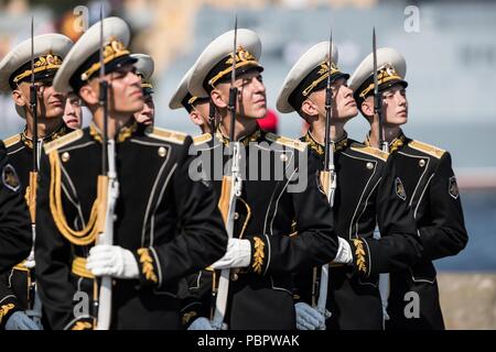 St. Petersburg. 29th July, 2018. Russian Navy personnel attend the Main Naval Parade to mark Russian Navy Day in St. Petersburg, Russia on July 29, 2018. The Navy Day is a national holiday in Russia that normally takes place on the last Sunday of July. Credit: Wu Zhuang/Xinhua/Alamy Live News Stock Photo