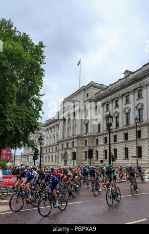 London, UK, 29 July 2018. Prudential RideLondon-Surrey Classic. The professional peloton set off from Horse Guards Parade in London for the sixth running of the 183km World Tour race, the RideLondon-Surrey Classic. The route tackles the Surrey Hills before returning to London to finish on The Mall. Credit: Clive Jones/Alamy Live News Stock Photo