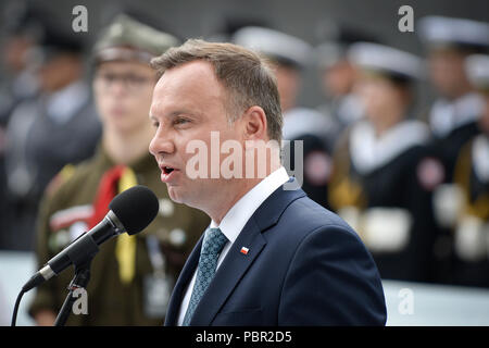 Warsaw, Poland. 29th July, 2018. Polish President Andrzej Duda (front) delivers a speech during memorial ceremonies marking the 74th anniversary of the outbreak of the 1944 Warsaw Uprising against the Germans during the World War II, in Warsaw, Poland, July 29, 2018. The Warsaw Uprising broke out on Aug. 1, 1944 and was the biggest resistance operation in German-occupied Europe. Credit: Jaap Arriens/Xinhua/Alamy Live News Stock Photo